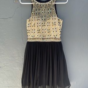 Crystal doll semi formal black and gold dress